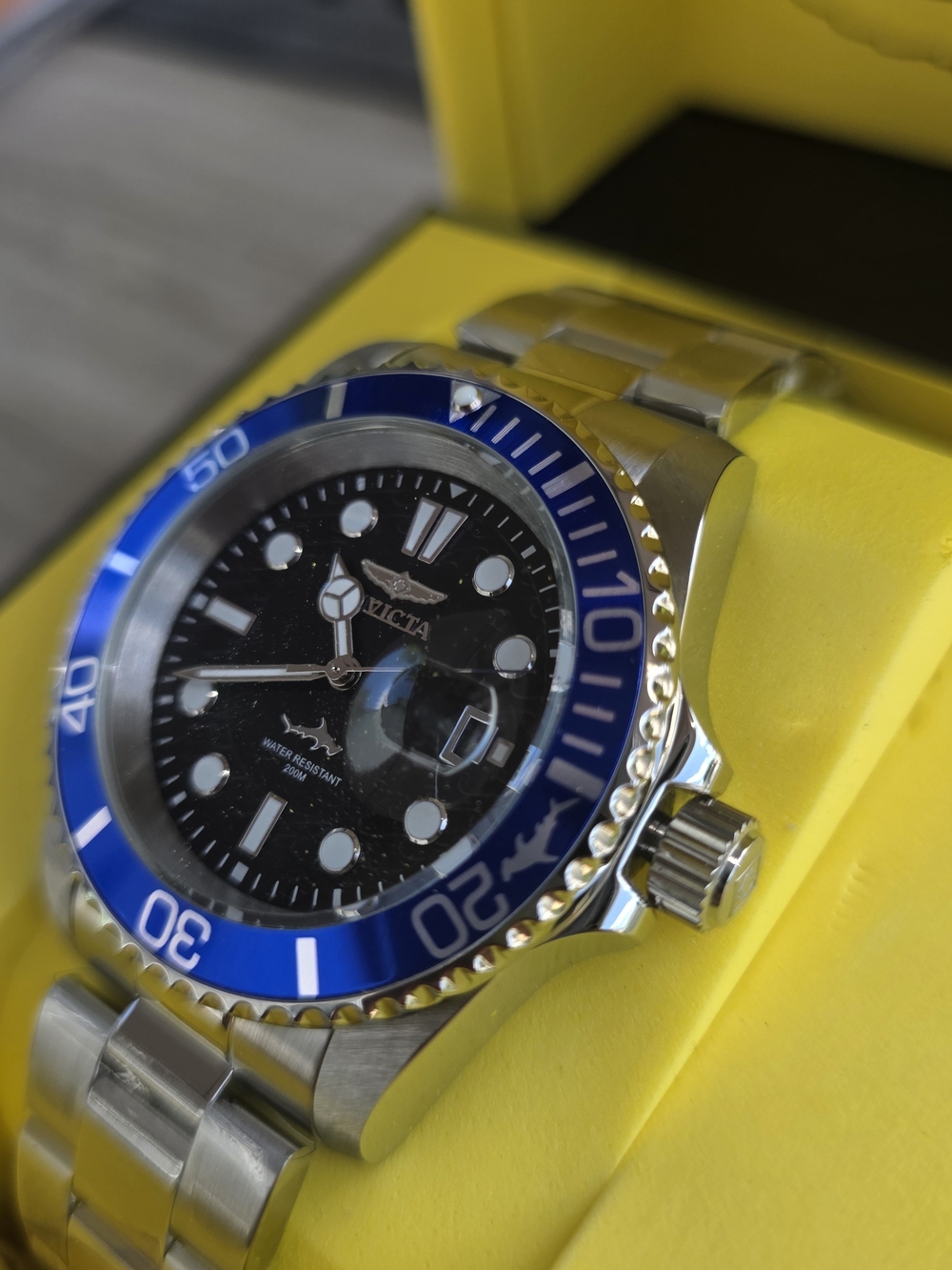 146.  Invicta Blue-Bezel, Black Face, Stainless Steel Dive Watch
